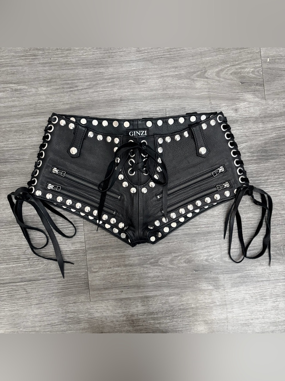 Ginzi black studded lace up leather shorts